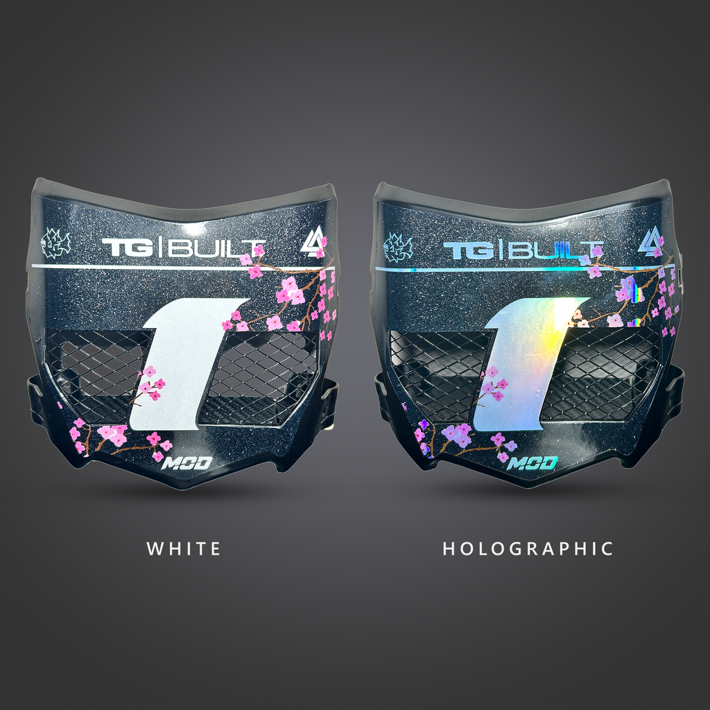 White vinyl and holographic vinyl vented plates side by side